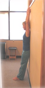 Arms can remain by your sides as well. Let the spine slide upwards  against the wall, stretcing towards the ceiling. Enjoy taller posture!